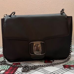 Salvatore Ferragamo Black Crossbody Bag with metalic black chain.